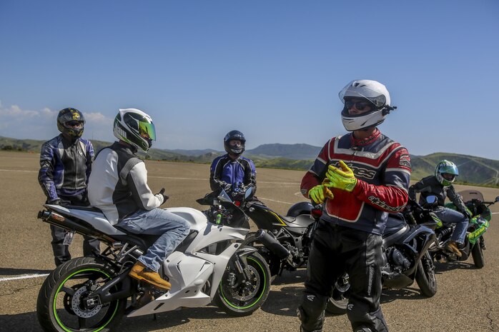 Staff Sgt. Andrew Eichelberger, motorcycle instructor with 4th Light Armored Reconnaissance, instructs during the Riders’ Essential Skills Training aboard Camp Pendleton, Calif. Marine motorcycle operators are required to take motorcycle rider safety training, and Marine Corps Installation Command’s Safety Division maintains a fleet of motorcycles and all-terrain and light utility vehicles for that purpose. Marine Corps Systems Command’s Cross-Competency Analysis Team, or CAT, created the Safety Vehicle Fleet Lifecycle Management Tool to assist MCICOM in forecasting replacement assets for the safety program. (U.S. Marine Corps photo by Sgt. Scott Reel)