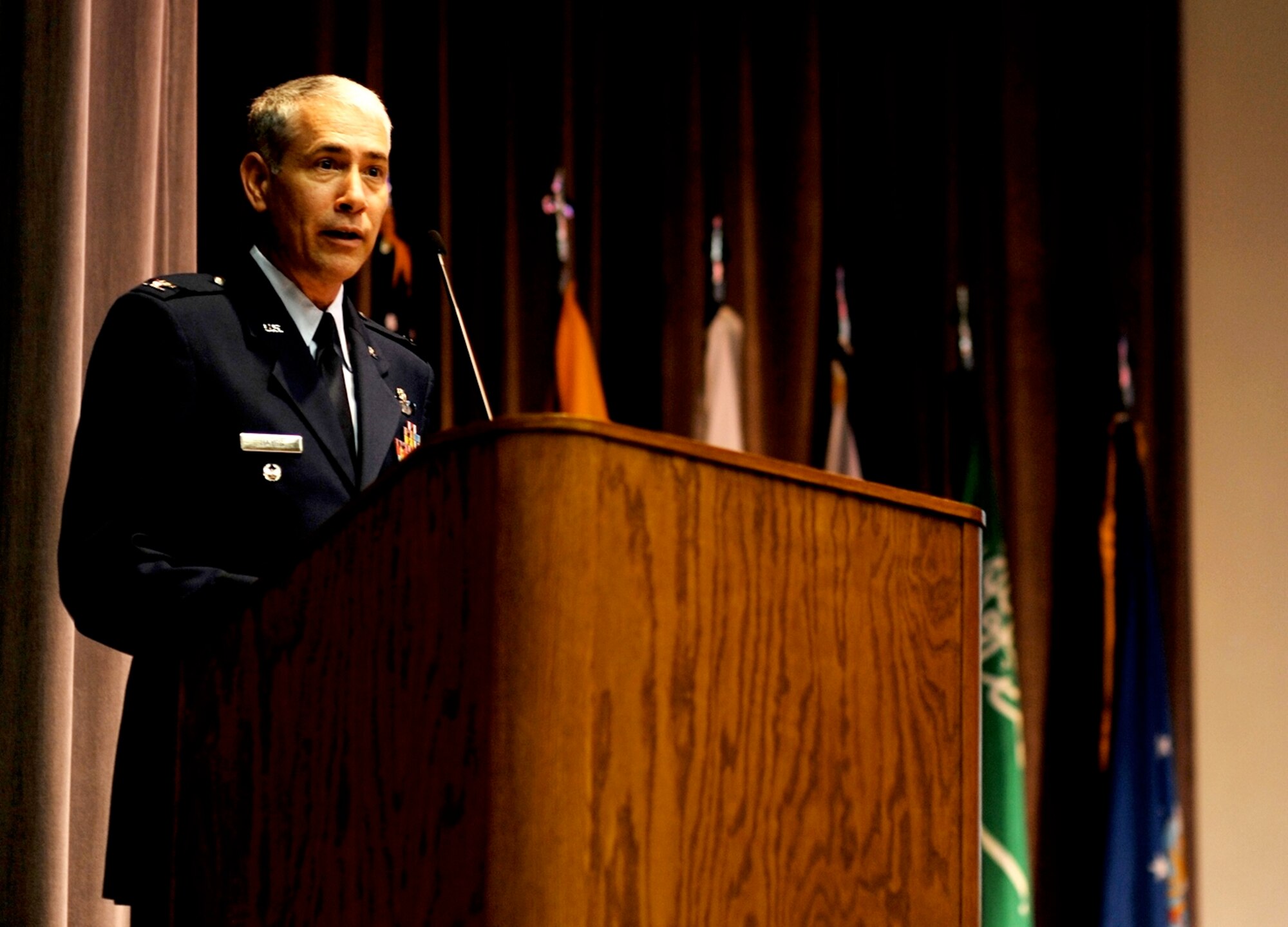 Col. Jerome Hayes, the Individual Mobilization Augmentee to the Division Chief, Air Force Senate Liaison, Office of the Secretary of the Air Force, the Pentagon, speaks to Specialized Undergraduate Pilot Training Class 16-01 during their graduation ceremony Oct. 23 on Columbus Air Force Base, Mississippi. Hayes imparted his words of wisdom to the newest aviators, stressing readiness and preparedness as paramount to success in the Air Force and in their personal lives. (U.S. Air Force photo/Elizabeth Owens)