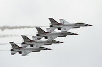 The U.S. Air Force Aerial Demonstration Squadron “Thunderbirds” practice performing F-16 acrobatic maneuvers Oct. 29, 2015 at Joint Base San Antonio-Randolph, Texas. The Thunderbirds team members arrived in preparation for the 2015 JBSA-Randolph Air Show and Open House to be held Oct. 31 and Nov. 1.  Air shows allow the Air Force to display the capabilities of our aircraft to the American taxpayer through aerial demonstrations and static displays and allowing attendees to get up close and personal to see some of the equipment and aircraft used by the U.S. military today.  (U.S. Air Force photo by Joel Martinez)