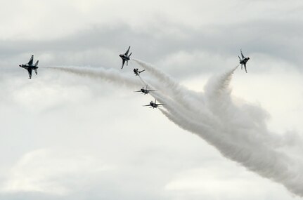 The U.S. Air Force Aerial Demonstration Squadron “Thunderbirds” practice performing F-16 acrobatic maneuvers Oct. 29, 2015 at Joint Base San Antonio-Randolph, Texas. The Thunderbirds team members arrived in preparation for the 2015 JBSA-Randolph Air Show and Open House to be held Oct. 31 and Nov. 1.  Air shows allow the Air Force to display the capabilities of our aircraft to the American taxpayer through aerial demonstrations and static displays and allowing attendees to get up close and personal to see some of the equipment and aircraft used by the U.S. military today.  (U.S. Air Force photo by Joel Martinez)