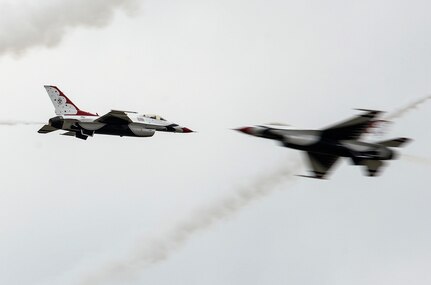 The U.S. Air Force Aerial Demonstration Squadron “Thunderbirds” practice performing F-16 acrobatic maneuvers Oct. 29, 2015 at Joint Base San Antonio-Randolph, Texas. The Thunderbirds team members arrived in preparation for the 2015 JBSA-Randolph Air Show and Open House to be held Oct. 31 and Nov. 1.  Air shows allow the Air Force to display the capabilities of our aircraft to the American taxpayer through aerial demonstrations and static displays and allowing attendees to get up close and personal to see some of the equipment and aircraft used by the U.S. military today.  (U.S. Air Force photo by Joel Martinez)
