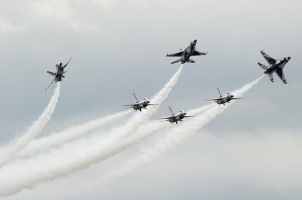 The U.S. Air Force Aerial Demonstration Squadron “Thunderbirds” practice performing F-16 acrobatic maneuvers Oct. 29, 2015 at Joint Base San Antonio-Randolph, Texas. The Thunderbirds team members arrived in preparation for the 2015 JBSA-Randolph Air Show and Open House to be held Oct. 31 and Nov. 1.  Air shows allow the Air Force to display the capabilities of our aircraft to the American taxpayer through aerial demonstrations and static displays and allowing attendees to get up close and personal to see some of the equipment and aircraft used by the U.S. military today.  (U.S. Air Force photo by Joel Martinez)