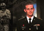 Army National Guard Sgt. Guy Mellor, of the 1st Battalion, 145th Field Artillery, Utah National Guard, answers questions during an interview at the Association of the United States Army annual meeting and exposition in Washington, D.C., on Oct. 11, 2011. Mellor was named the Army's Noncommissioned Officer of the Year.