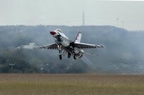 The U.S. Air Force Aerial Demonstration Squadron “Thunderbirds” takes off before practicing F-16 acrobatic maneuvers Oct. 29, 2015 at Joint Base San Antonio-Randolph, Texas. The Thunderbirds team members arrived in preparation for the 2015 JBSA-Randolph Air Show and Open House to be held Oct. 31 and Nov. 1.  Air shows allow the Air Force to display the capabilities of our aircraft to the American taxpayer through aerial demonstrations and static displays and allowing attendees to get up close and personal to see some of the equipment and aircraft used by the U.S. military today.  (U.S. Air Force photo by Joel Martinez/Released)