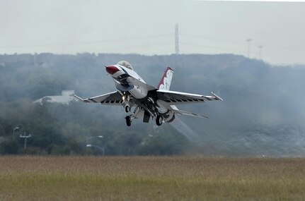 The U.S. Air Force Aerial Demonstration Squadron “Thunderbirds” takes off before practicing F-16 acrobatic maneuvers Oct. 29, 2015 at Joint Base San Antonio-Randolph, Texas. The Thunderbirds team members arrived in preparation for the 2015 JBSA-Randolph Air Show and Open House to be held Oct. 31 and Nov. 1.  Air shows allow the Air Force to display the capabilities of our aircraft to the American taxpayer through aerial demonstrations and static displays and allowing attendees to get up close and personal to see some of the equipment and aircraft used by the U.S. military today.  (U.S. Air Force photo by Joel Martinez/Released)