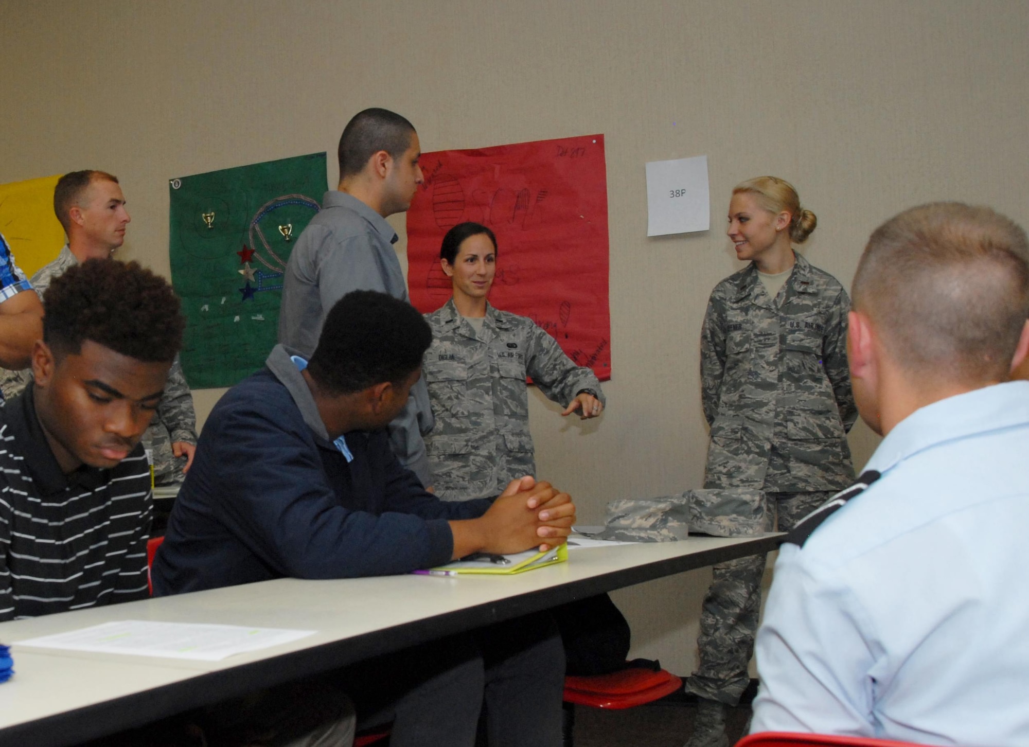 U.S. Air Force 1st Lt. Morgan K. Diglia, 17th Training Wing Sexual Assault Prevention and Response deputy, speaks with Angelo State University Air Force ROTC Detachment 847 cadets during a mentorship program in Rassman Building at ASU in San Angelo, Texas, Oct. 28, 2015. During the mentorship opportunity, company grade officers told ROTC cadets about different career fields. (U.S. Air Force photo by Senior Airman Joshua Edwards/Released)