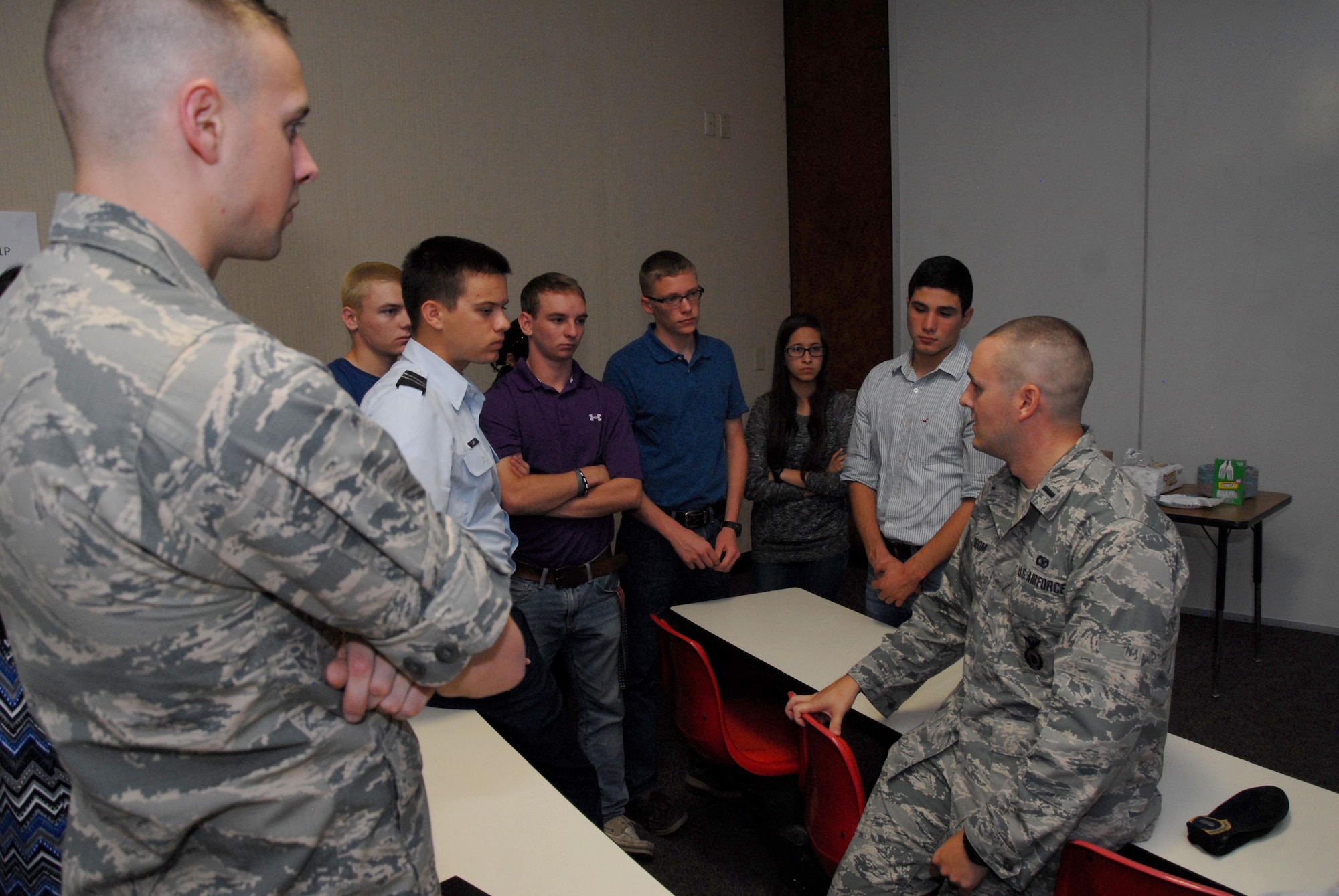 U.S. Air Force 1st Lt. Richard K. Odom, 17th Security Forces Squadron operations officer, speaks with Angelo State University Air Force ROTC Detachment 847 cadets during a mentorship program in Rassman Building at ASU in San Angelo, Texas, Oct. 28, 2015. During the mentorship opportunity, ROTC cadets asked about different career fields within the active duty Air Force. (U.S. Air Force photo by Senior Airman Joshua Edwards/Released)