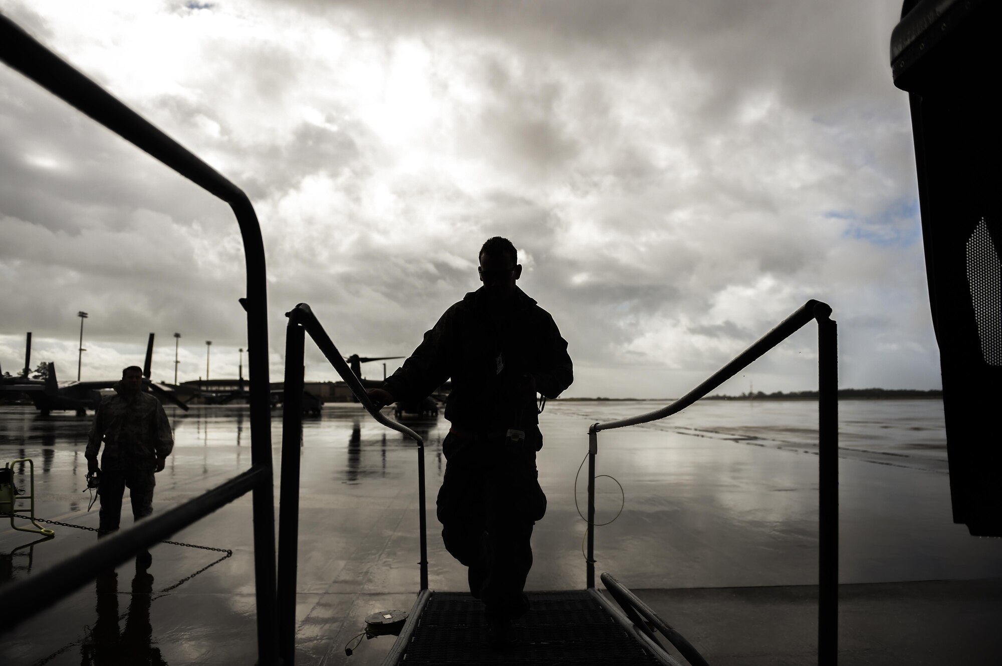 Senior Airman Braden Ferrell, 801st Special Operations Aircraft Maintenance Squadron crew chief, prepares to perform routine maintenance on a CV-22B Osprey engine at Hurlburt Field, Fla., Oct. 27, 2015. The 801st SOAMXS crew chiefs continued normal operations despite the after-effects of Hurricane Patricia at Hurlburt Field. (U.S. Air Force photo by Senior Airman Christopher Callaway/Released)