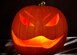 ALTUS AIR FORCE BASE, Okla. – Light illuminates a jack-o-lantern, Oct. 29, 2015. Fall is the time for fun but it is important to always stay safe. Use heatless artificial lights instead of candles to light jack-o-lanterns  . (U.S. Air Force photo by Airman 1st Class Kirby Turbak/Released)