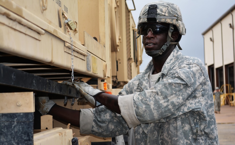 Sgt. Julius Anderson, motor sergeant 546th Area Support Medical Company, grabs the ladder from a tow truck during the Wheeled Vehicle Recovery Course at Regional Training Site Maintenance-Fort Hood, Texas, Oct. 22, 2015. The course teaches Army mechanics how to properly and safely recover and tow vehicles that may be stuck or inoperable.