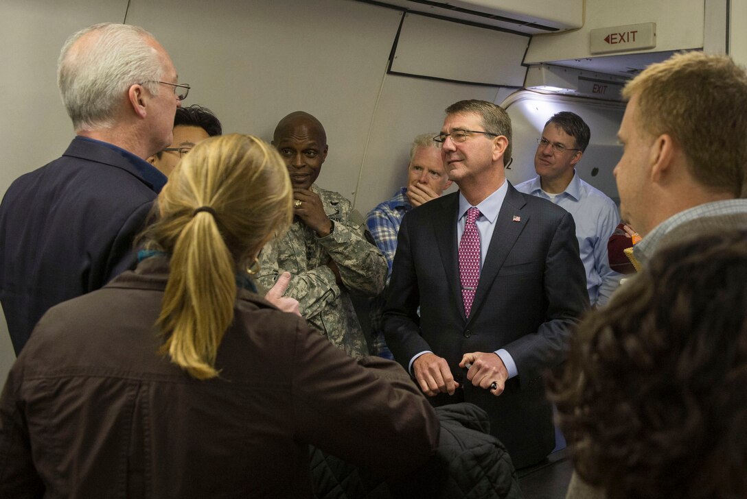 Defense Secretary Ash Carter speaks with reporters as they prepare to depart Joint Base Andrews, Md., Oct. 30, 2015, on an eight-day trip to advance the next phase of the U.S. military’s rebalance to the Asia-Pacific region. Carter intends to meet with U.S. service members and leaders from more than a dozen nations across East Asia and South Asia, to help modernize longtime alliances and build new partnerships. It is Carter’s third visit to the Asia-Pacific region in eight months. DoD photo by U.S. Air Force Senior Master Sgt. Adrian Cadiz