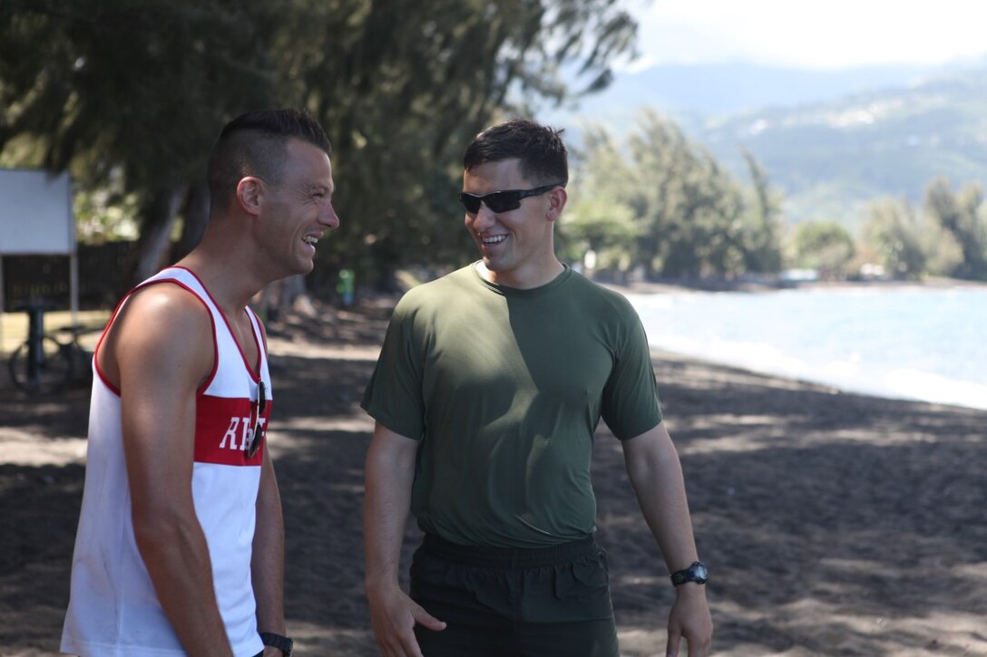 1st Lt. Bradley Wilson, platoon commander for engineer platoon, Koa Moana 15-3, speaks to Lt. Romerald Lemoigne, commander of 48 Signals Regiment during a training exercise in Tahiti, Sept. 28. Koa Moana (Ocean Warrior) aims to enhance senior military leader engagements between allied and partner nations, and also provides an opportunity for cultural insight and relationships between participating nations.