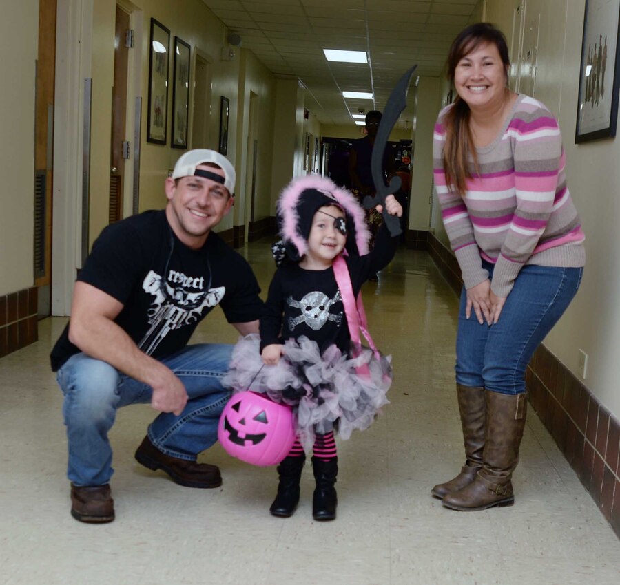 Numerous costumed toddlers from Marine Corps Logistics Base Albany’s Child Development Center celebrate Halloween in the hallways of Buildings 3500 and 3700, Oct. 29. “Trick-or-treat” rang out from the youngsters as they paraded past office doors, stopping for candy handouts from Marines, civilian-Marines and contractors.