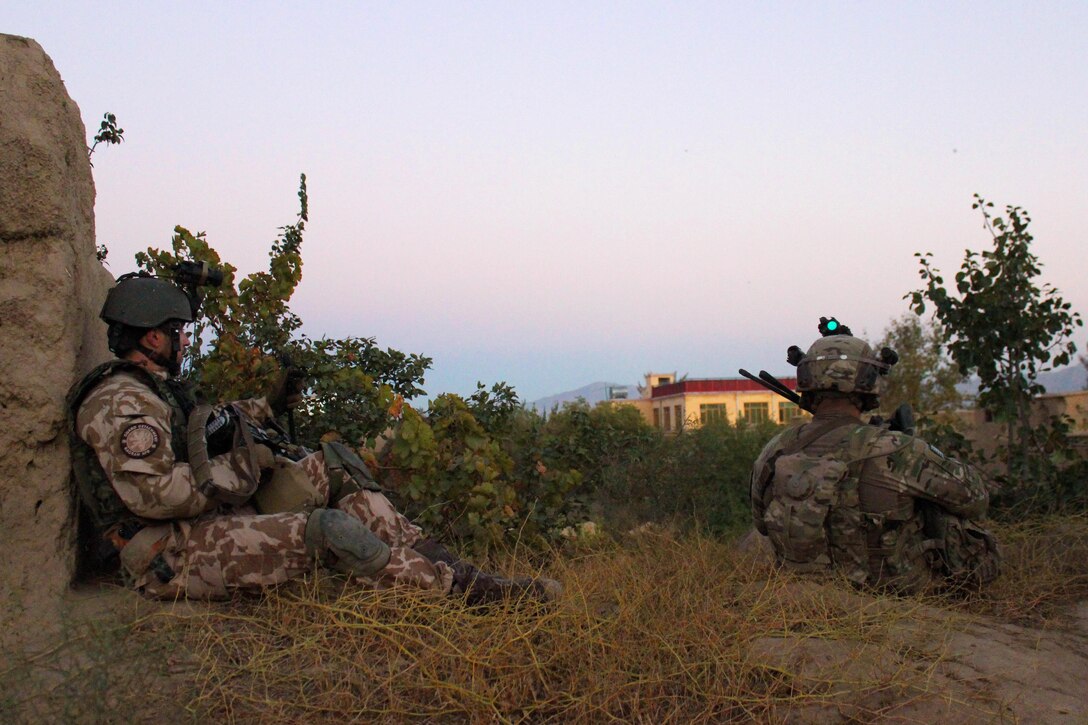 U.S. and Czech soldiers take a break during a patrol through a village in Parwan province, Afghanistan, Oct. 20, 2015. U.S. Army photo by Sgt. 1st Class David Wheeler