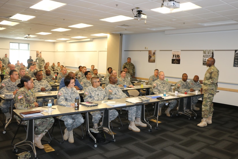 The 310th Sustainment Command (Expeditionary) senior enlisted adviser Command Sgt. Maj. Levi G. Maynard, speaks at the Indianapolis Recruiting Battalion Partnership Zone Conference focused on implementing the Army’s total force policy at Fort Benjamin Harrison, Ind., Oct. 24, 2015. Leaders from the Army Reserve’s 310th Sustainment Command (Expeditionary), Indiana Reserve Officer Training Corps (ROTC), the Army Reserve Careers Division (ARCD), and the U.S. Army’s Recruiter Battalion Indianapolis (USAREC) gathered at the Spc. Luke P. Frist Army Reserve Center on Fort Benjamin Harrison to coordinate focused recruiting support for the Army’s Total Force policy.