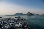 BUSAN, Republic of Korea (Oct. 30, 2015) - The U.S. Navy's only forward-deployed aircraft carrier USS Ronald Reagan (CVN 76) prepares to moor in Busan for a goodwill port visit. Ronald Reagan and its embarked air wing, Carrier Air Wing (CVW) 5, provide a combat-ready force that protects and defends the collective maritime interests of the U.S. and its allies and partners in the Indo-Asia-Pacific region. 