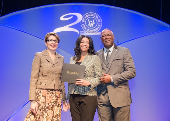 Porscha Porter, an electrical engineer at the U.S. Army Engineering and Support Center, Huntsville, receives a Technology Rising Star award at the 20th Women of Color STEM conference in Detroit, Michigan, Oct. 15-17. 