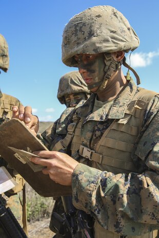 Private First Class Aldrich C. Servilla, Echo Company, 2nd Recruit Training Battalion, plots each location his fire team must find during the Land Navigation Course at Edson Range, Marine Corps Base Camp Pendleton, Calif., Oct. 20. Servilla graduated from Reedley International School at 18 years old and then earned a degree in social sciences from Ateneo De Manila University when he was 22 years old.  Today, all males recruited west of the Mississippi are trained at MCRD San Diego. The depot is responsible for training more than 16,000 recruits annually. Echo Company is scheduled to graduate Oct. 30.