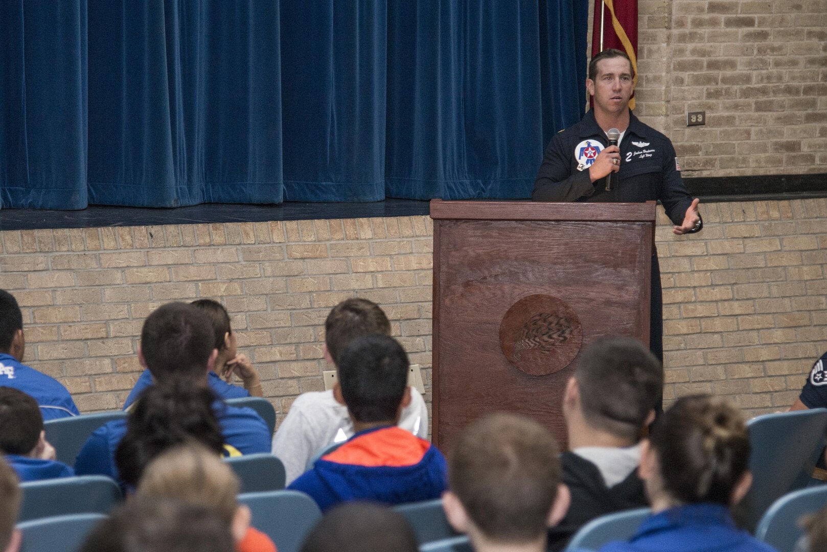 Maj. Joshua Boudreaux, Air Force Air Demonstration Squadron Thunderbird 2, speaks to Samuel Clemens High School students Oct. 30, 2015, at Samuel Clemens High School in Universal City, Texas. The Thunderbirds will be performing at the JBSA Air Show and Open House Oct. 31 and Nov. 1 at 3 p.m.