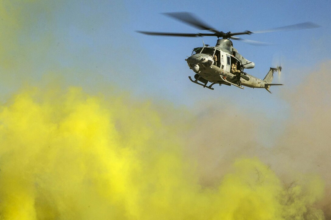 A Marine Corps UH-1Y Venom helicopter prepares to land during a casualty evacuation exercise at Fire Base Burt, Chocolate Mountain Aerial Gunnery Range, Calif., Oct. 22, 2015. The helicopter crew is assigned to Marine Aviation Weapons and Tactics Squadron 1. U.S. Marine Corps photo by Lance Cpl. Roderick L. Jacquote 