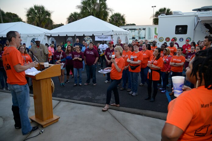 Veterans Stand Down Chairman Dr. Hugh Myrick, Chief of Mental Health at the Charleston VA Medical Center, welcomes volunteers and directs them to their stations during the Veteran Stand Down at the VA Community Resource and Referral Center on Friday, Oct. 30, 2015. (VA Photo by James Arrowood)