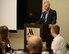 Col. B. Phillip Heseltine, 22nd Air Refueling Wing vice commander, speaks during the 384th Air Refueling Squadron reunion dinner, Oct. 24, 2015, at a hotel in Wichita, Kan. A reunion is held every two years to bring younger Airmen and retired Squarepatchers together to connect with each other. (U.S. Air Force photo by Airman 1st Class Christopher Thornbury)