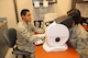 Senior Airman Aalona Chandler performs an eye examination on a member of the 127th Wing at Selfridge Air National Guard Base, Mich., Oct. 17, 2015. Chandler, an optometry technician with the 127th Medical Group, said almost every member of the Wing eventually has to see him for an eye exam, giving him an appreciation for the diversity that exists in the Wing. (U.S. Air National Guard photo by Staff Sgt. Samara Taylor)