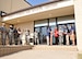 Cutting the ceremonial ribbon to officially reopen the Gerrity Fitness and Sports Center are, from left, Dale Armstrong, assistant fitness director; Corie Wells, fitness center director; Col. Lea Kirkwood, 72nd Air Base Wing vice commander; Erica Dawson and Tyrese Flagg, both recreation assistants. After more than a year and $2 million in renovations and construction, patrons were able to see the improvements Oct. 21. The Gerrity now includes features such as new flooring in the basketball gym, an extended balcony for cardio equipment and additional weight room space. (Air Force photo by Kelly White/Released)