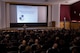 U.S. Air Force Col. Joseph McFall, 52nd Fighter Wing commander, speaks during a town hall meeting inside the base theater Oct. 30, 2015, Spangdahlem Air Base, Germany. McFall and other 52nd FW leadership spoke to parents and teachers about the upcoming school move during the event. (U.S. Air Force photo by Senior Airman Rusty Frank/Released)