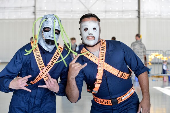 Creech Airmen pose for a photo during the 2015 Children’s Halloween party Oct. 30, 2015, at Creech Air Force Base, Nevada. The event gave Air Force children the opportunity for a day of fun with their parent and other families. (U.S. Air Force photo by Senior Airman Adarius Petty/Released)
