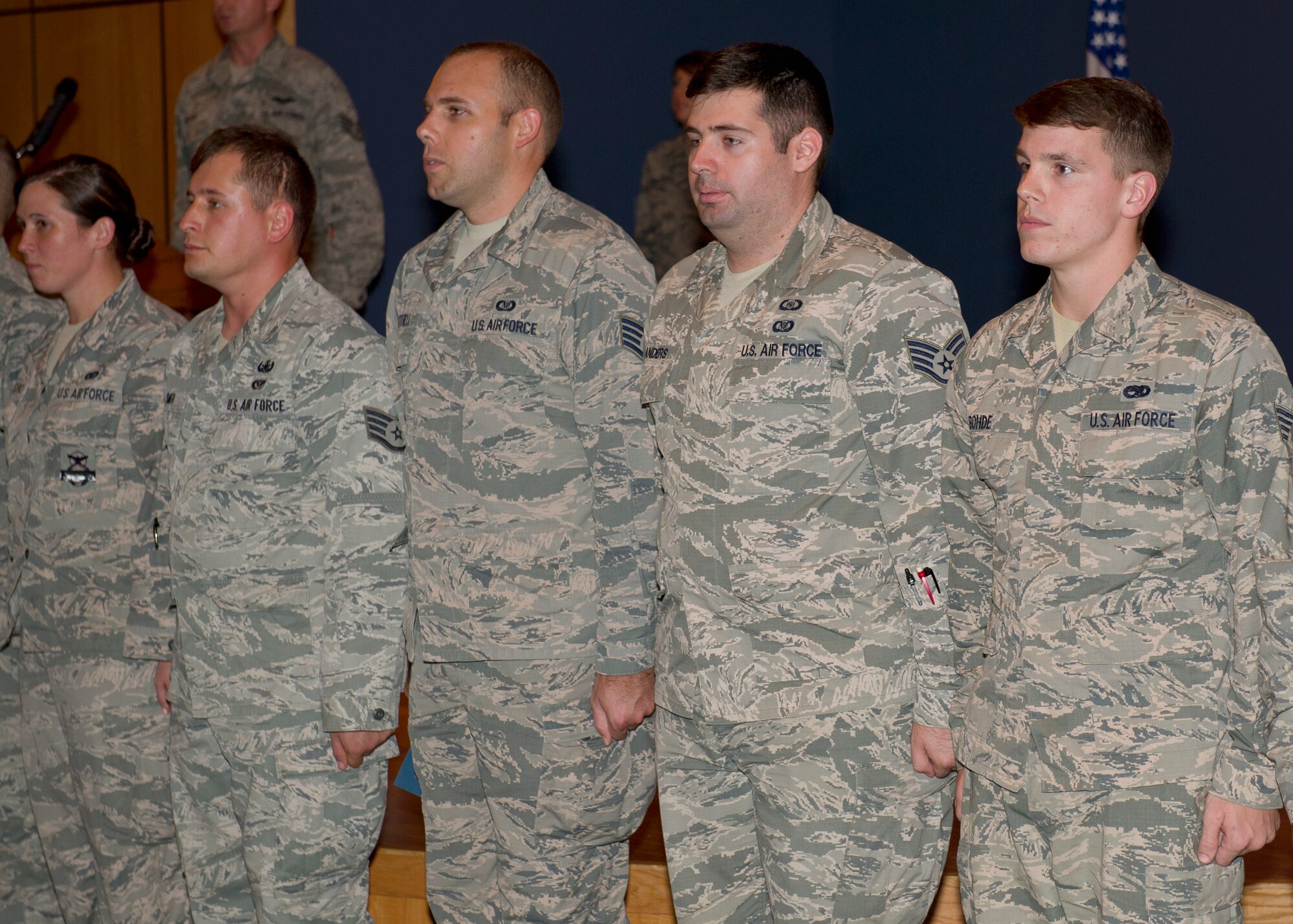 Tyndall’s newest promotees stand at attention at the November promotion ceremony October 28 at the Horizon’s Ballroom. The monthly promotion ceremony honors those Airmen receiving a new rank. (U.S. Air Force photo by Senior Airman Alex Fox Echols III/Released)