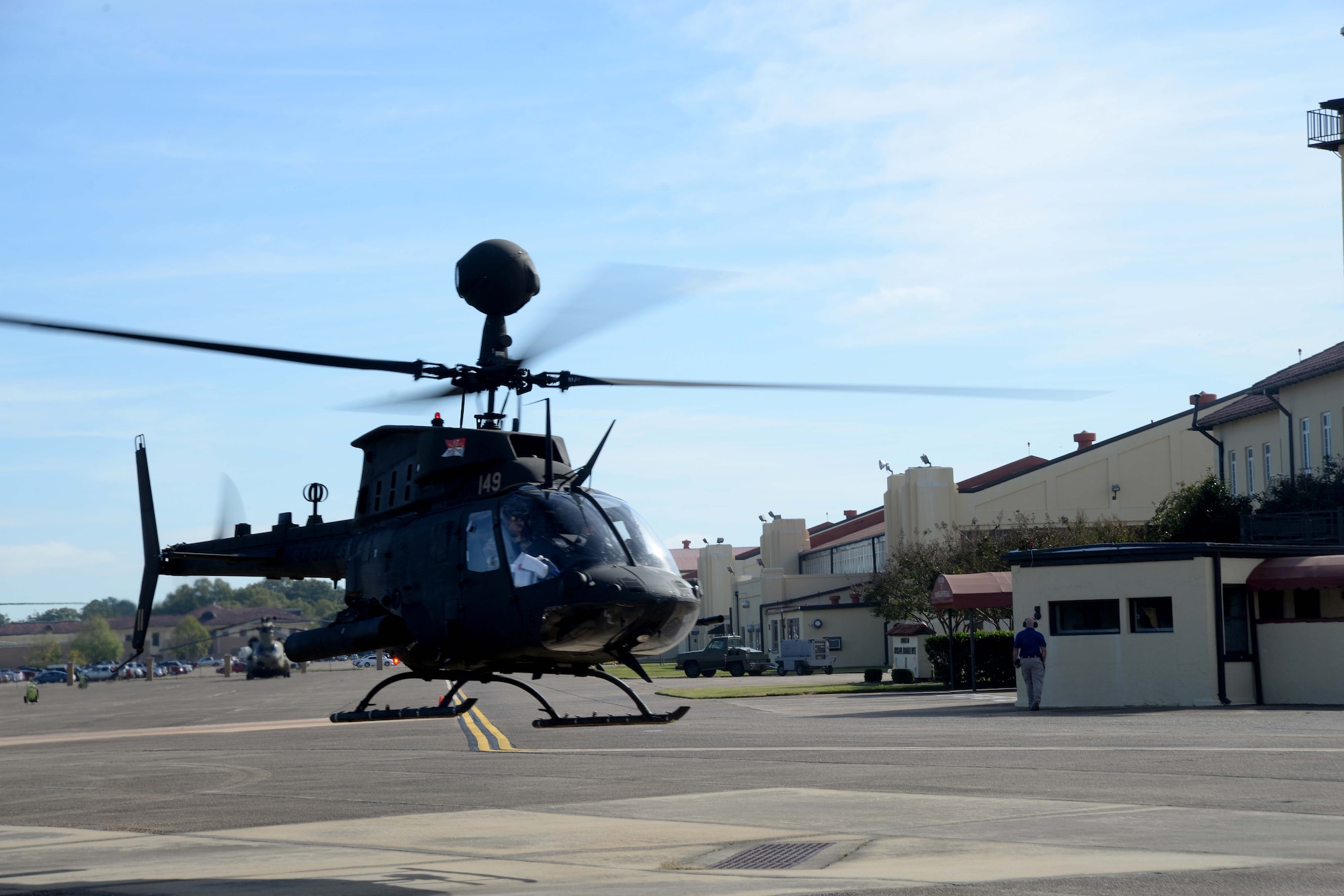 An OH-58 Kiowa Warrior takes flight from the Maxwell flightline Oct. 22, 2015, at Maxwell Air Force Base, Alabama. The aircraft was one of 27 aircraft from Fort Bragg, North Carolina stopping at Maxwell to re-fuel during its flight to Fort Polk, Louisiana. (U.S. Air Force photo by Airman 1st Class Alexa Culbert)