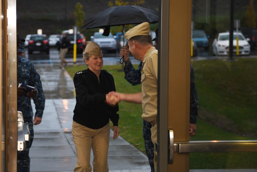 Navy Vice Adm. Robin R. Braun, chief of the Navy Reserve, greets Cmdr. Craig Frangente at the Navy Operational Support Center - Pittsburgh at the Pittsburgh International Airport Air Reserve Station, Oct. 3, 2015. This was the first time Braun visited the NOSC since its ribbon cutting ceremony in June 2014. (U.S. Air Force photo by Senior Airman Marjorie A. Bowlden)