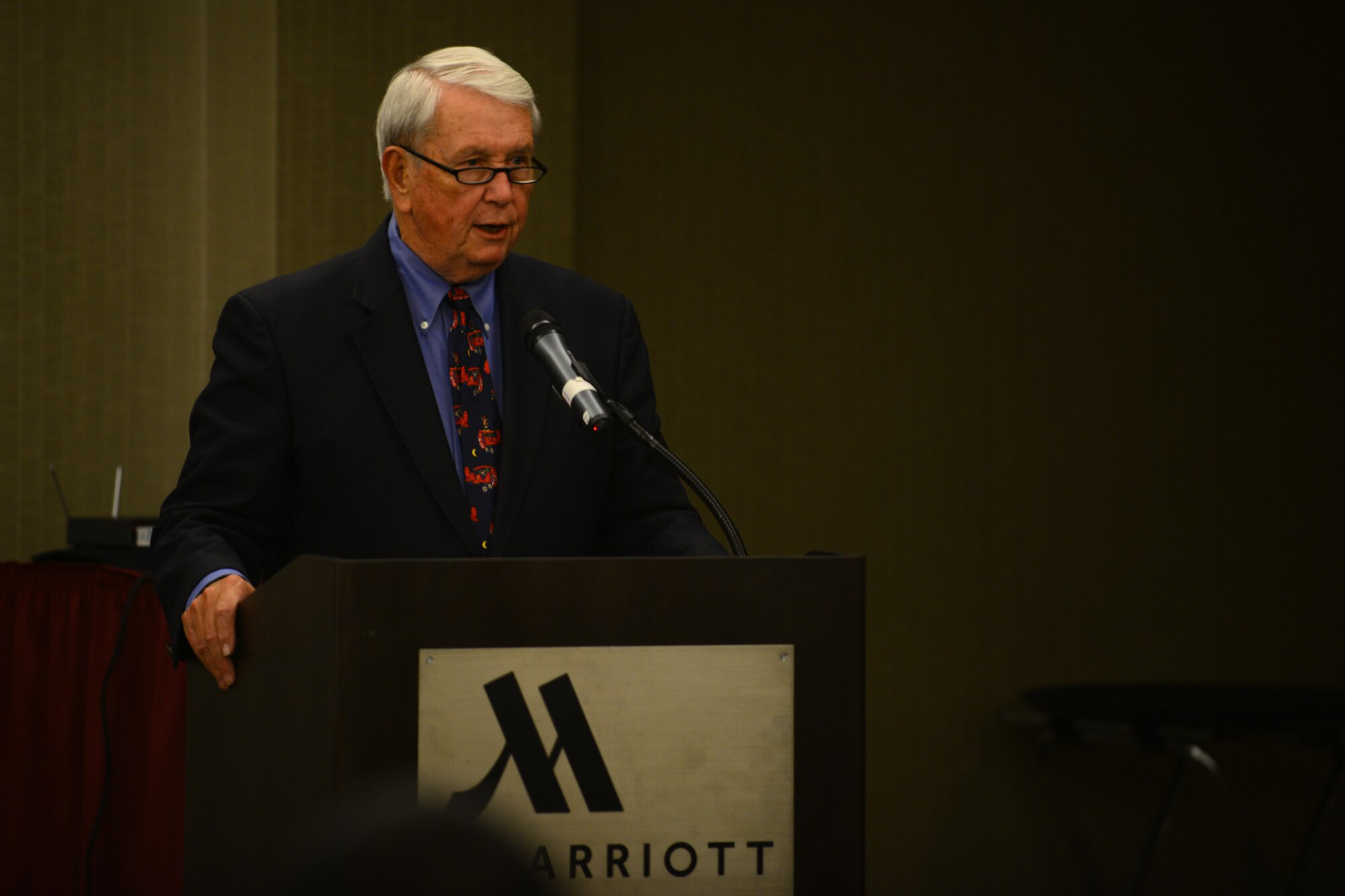 Retired Gen. James Davis, former Squarepatcher, speaks to the attendants of the 384th Air Refueling Squadron reunion dinner, Oct. 24, 2015, at a hotel in Wichita, Kan. Davis shared stories of when he flew the KC-97 Stratotanker as a Squarepatcher and later of how the same unit saved him from unforseeable measures when his aircraft was excessively damaged. (U.S. Air Force photo by Airman 1st Class Christopher Thornbury)