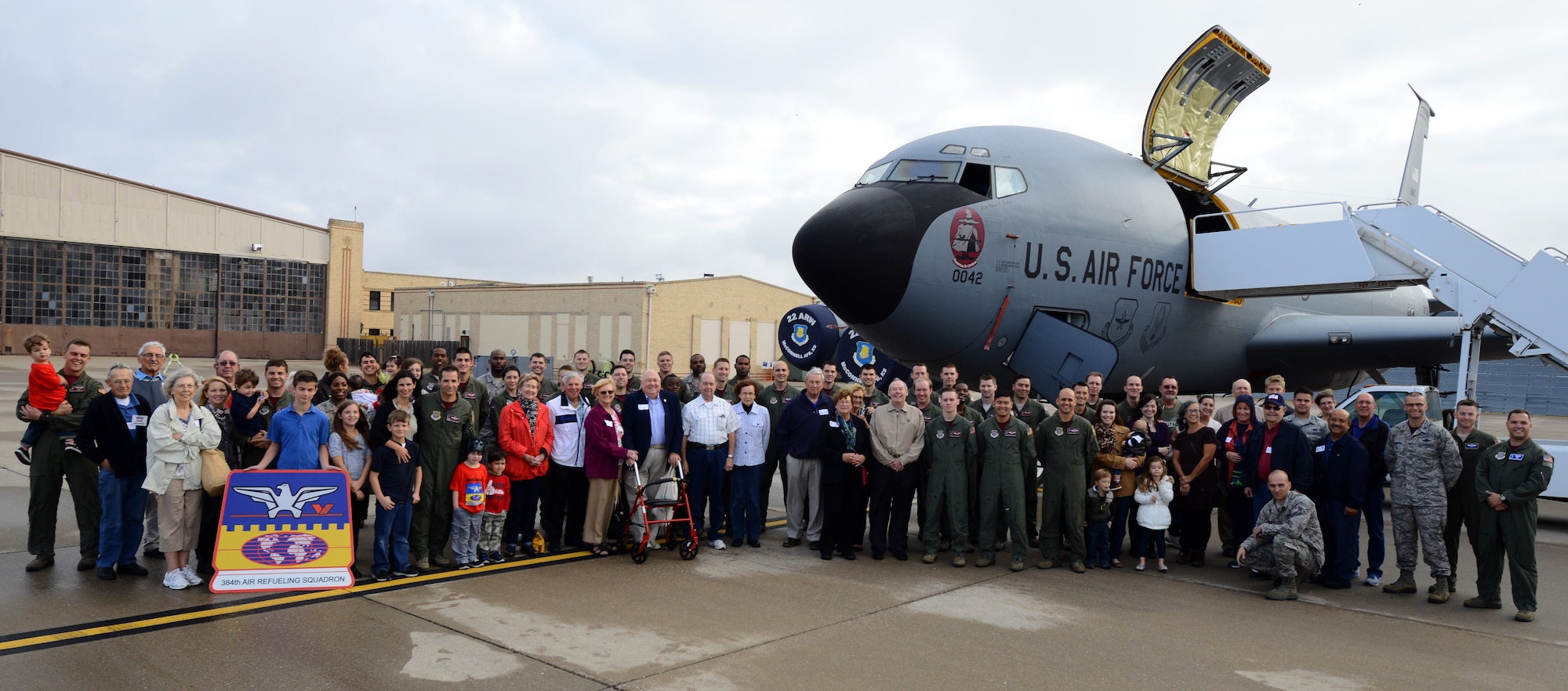 Current and retired squarepatchers pose for a photo, Oct. 23, 2015, at McConnell Air Force Base, Kan. A reunion is held every two years to bring younger Airmen and retired Squarepatchers together to connect with each other share stories, recognize the squadrons heritage and further instill their traditions. (U.S. Air Force photo by Airman 1st Class Christopher Thornbury)