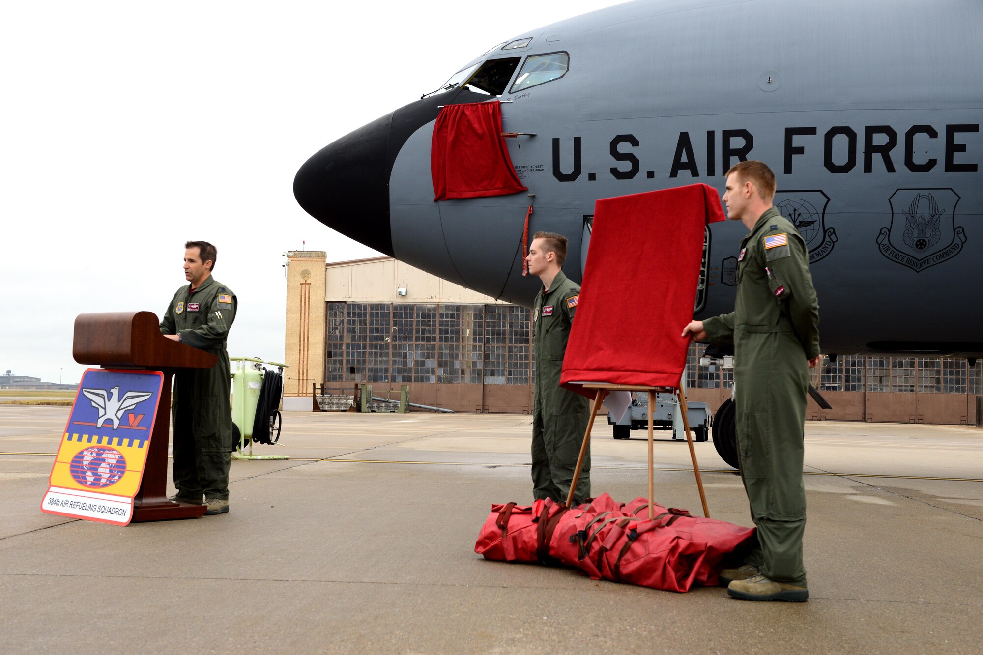 Lt. Col. Eric Hallberg, 384th Air Refueling Squadron commander, speaks to an audience during the noseart reveal, Oct. 23, 2015, at McConnell Air Force Base, Kan. The noseart reveal was one event during the 384th ARS reunion, a reunion is held every other year to recognize the squadrons heritage and further instill their traditions. (U.S. Air Force photo by Airman 1st Class Christopher Thornbury)