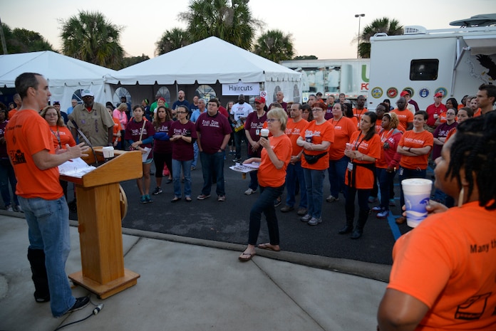 Veterans Stand Down Chairman Dr. Hugh Myrick, Chief of Mental Health at the Charleston VA Medical Center, welcomes volunteers and directs them to their stations during the Veteran Stand Down at the VA Community Resource and Referral Center on Friday, Oct. 30, 2015. (VA Photo by James Arrowood)