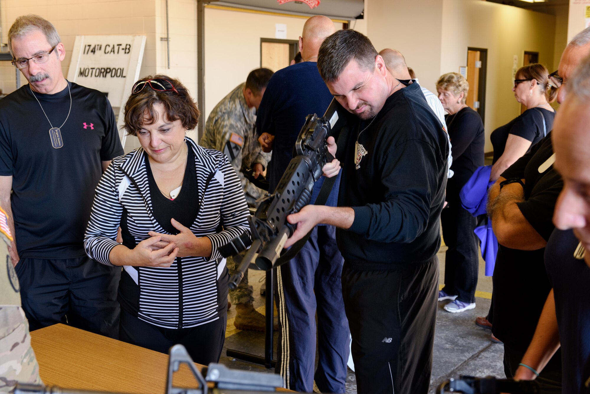 Civic leaders get an up-close look at various weapons during the Honorary Commanders Boot Camp Oct. 29, 2015, at Joint Base McGuire-Dix-Lakehurst, N.J. The event consisted of demonstrations, briefings, drill practice, all in a boot camp-like atmosphere. (U.S. Air Force photo by Robert Williard/Released)
