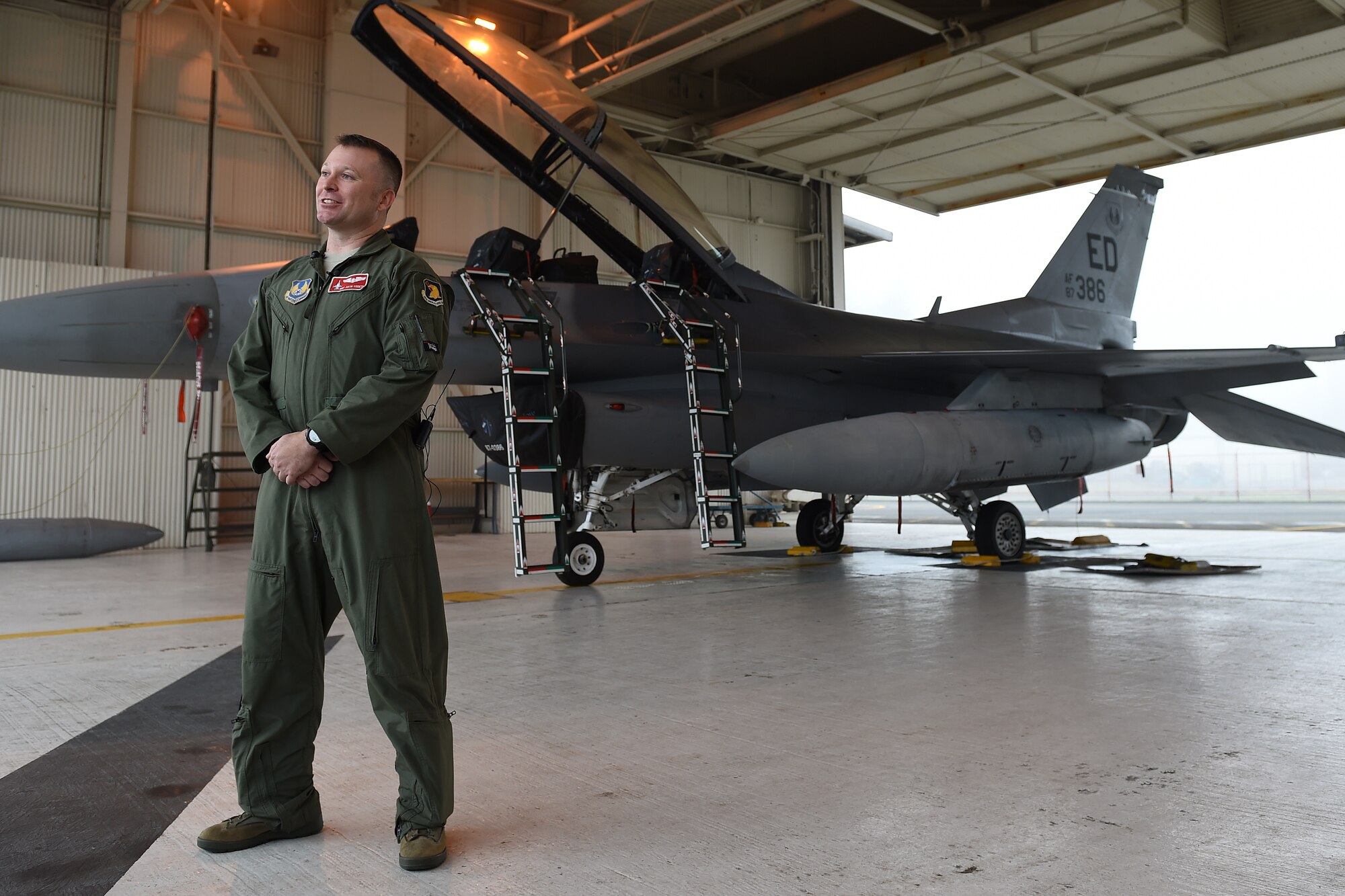 Master Sgt. Justin Suddeth, 40th Test Flight Squadron aerial broadcaster, gives an on-camera interview with local media outlets on the McChord Field flightline Oct. 26, 2015, at Joint Base Lewis-McChord, Wash. Suddeth is part of an Edwards Air Force Base F-16 Falcon aircrew here supporting the KC-46 Pegasus Flight Test Program.(U.S. Air Force photo/Senior Airman Naomi Shipley) 
