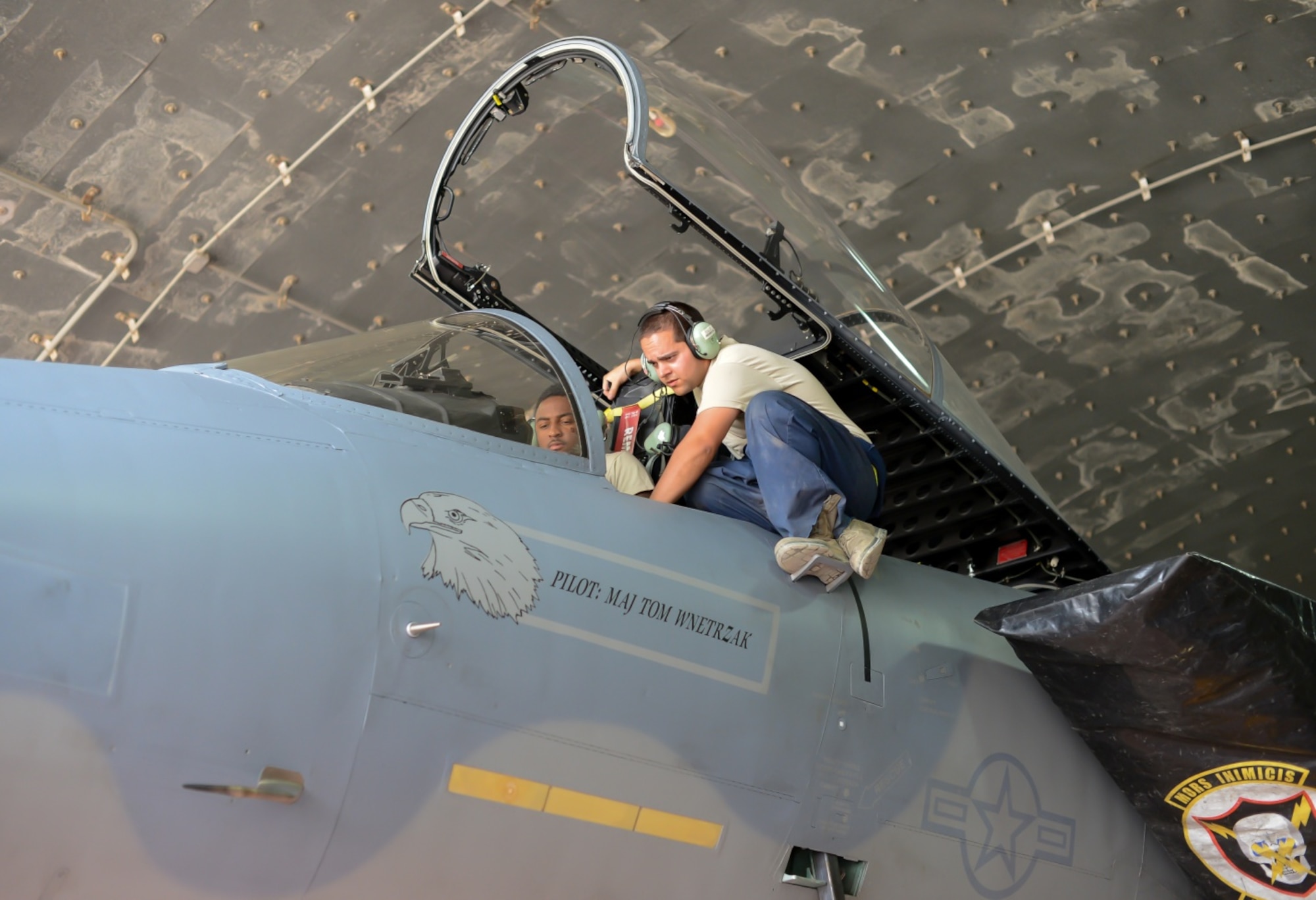 Airman 1st Class John Gates and Staff Sgt. Aaron Ornellss, 493rd Aircraft Maintenance Unit, Royal Air Force, Lakenheath, test the flight control system of an F-15C Eagle during the Blue Flag exercise Oct. 19, 2015, at Uvda Air Force Base, Israel. The exercise was conducted from Oct. 18-29 and allowed visiting nations' air forces the opportunity to train in a desert environment while completing missions with partner nations. (U.S. Air Force photo by 2nd Lieutenant Kellie Rizer)