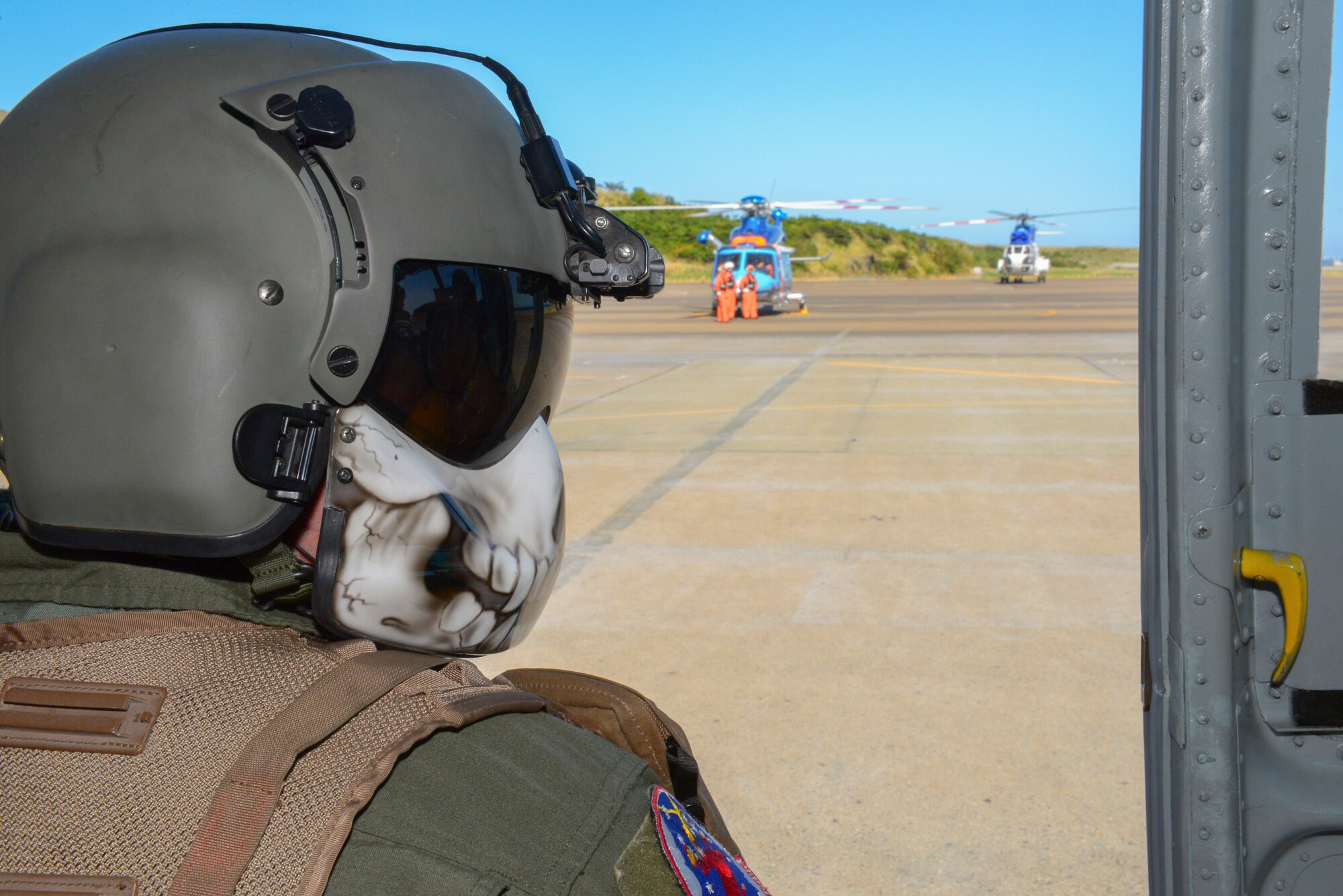 Staff Sgt. Christopher Rector, 459th Airlift Squadron special missions aviator, waits for takeoff at Miakejima Island, Japan, Oct. 28, 2015. Rector delivered simulated medical supplies as part of a Tokyo Metropolitan Government disaster relief exercise. (U.S. Air Force photo by Airman 1st Class Elizabeth Baker/Released)