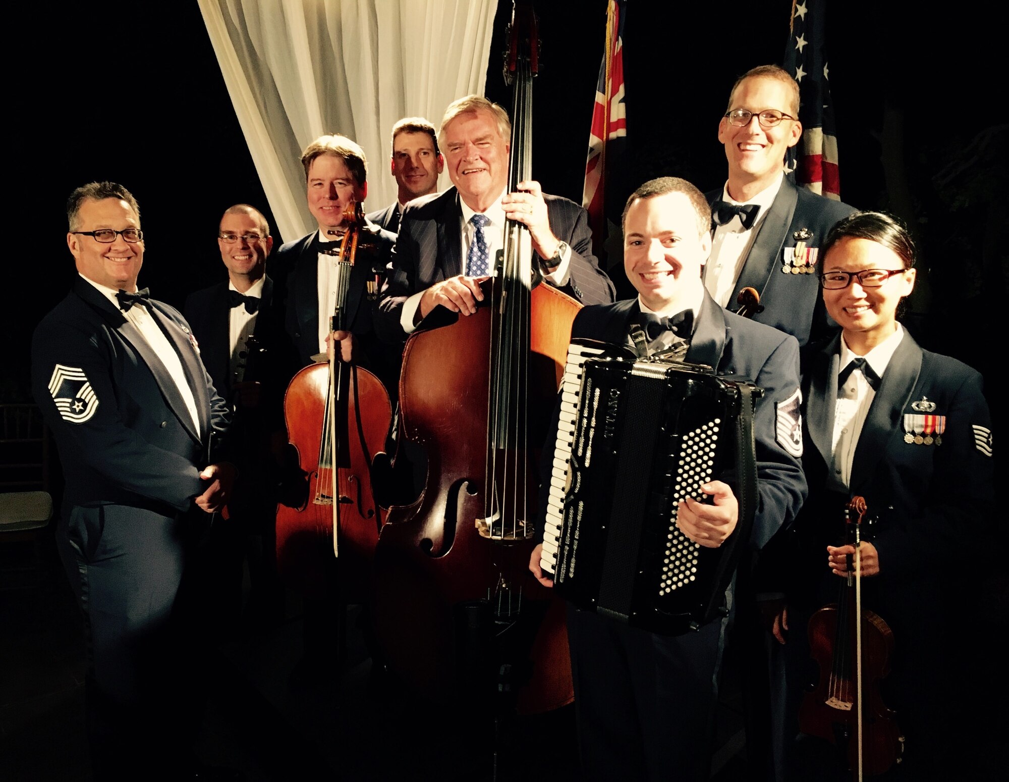 Members of the Air Force Strings with the Honorable Kim Beazley, Australian
Ambassador to the U.S. The Strings were on hand recently to help celebrate
75 years of bilateral relations between the U.S. and Australia. (Photo
courtesy Master Sgt. Will Hurd, released)
