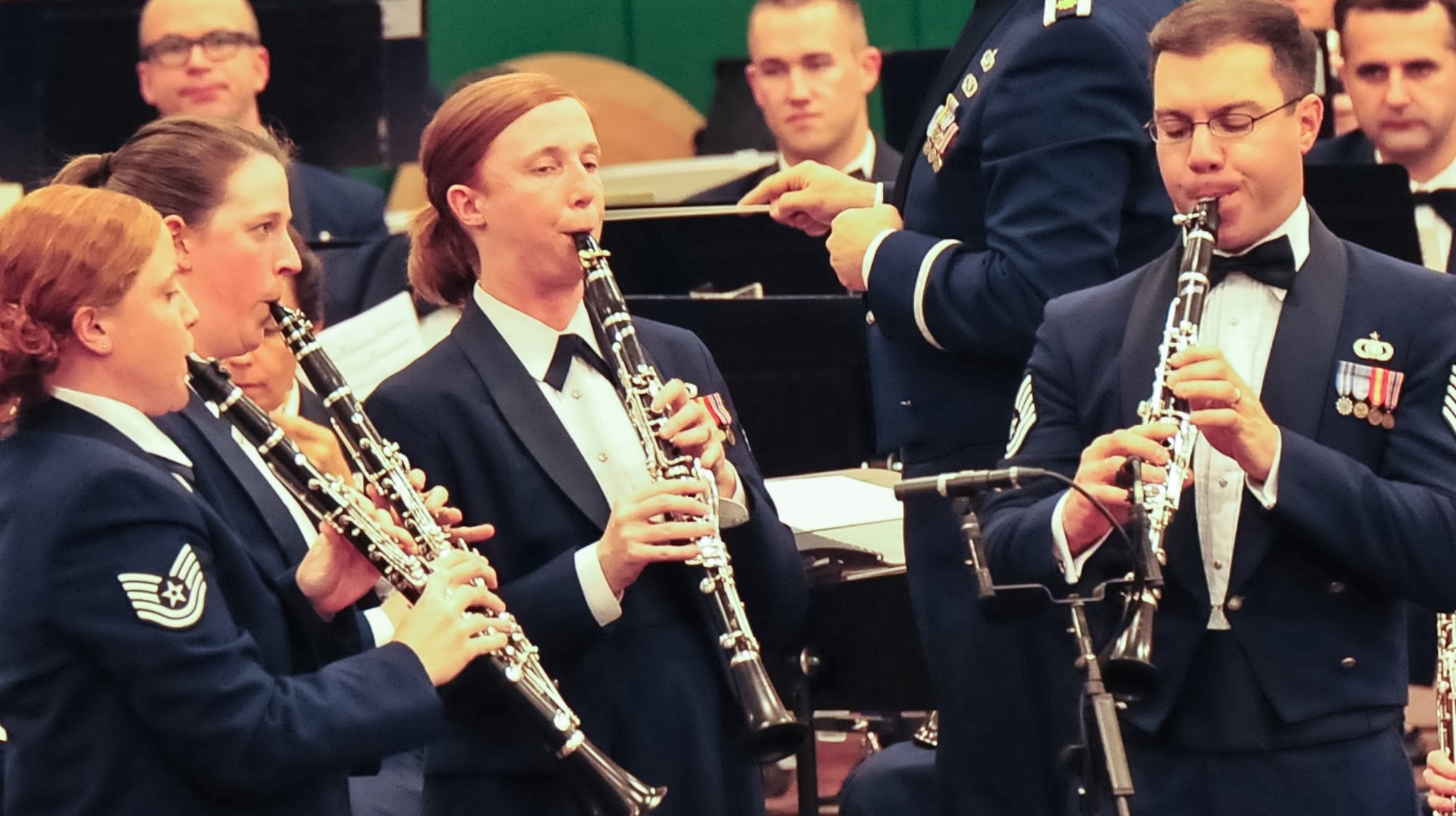 (Left to right) Technical Sgts. Sara Wollmacher, Laura Shoun, Kristin
Bowers and Brian Wahrlich perform an encore during a concert in Albany, N.Y.
The Concert Band and Singing Sergeants recently wrapped-up a 10 concert tour
of New England. (Photo by A1C Latasia Gross/released)
