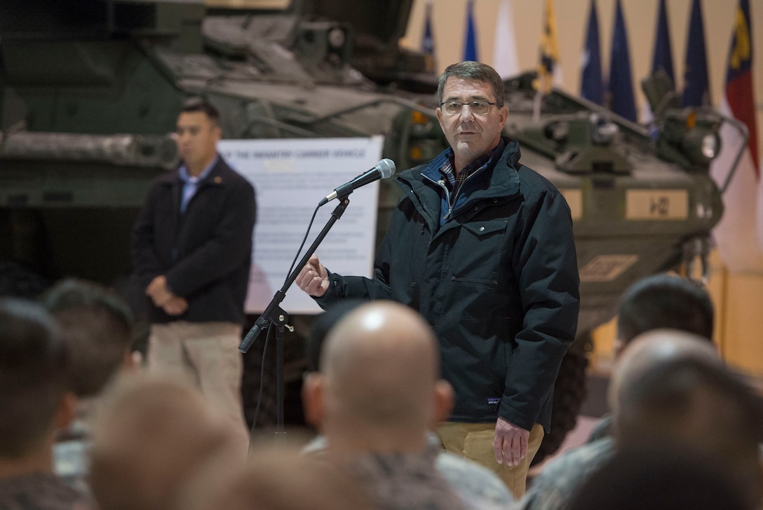 Defense Secretary Ash Carter speaks with soldiers and airmen during a visit to Fort Wainwright, Alaska, Oct. 30, 2015. Carter is visiting the Asia-Pacific region, where he will meet with leaders from more than a dozen nations to help advance the next phase of the U.S. military’s rebalance in the region by modernizing longtime alliances and building new partnerships. Photo by Air Force Senior Master Sgt. Adrian Cadiz