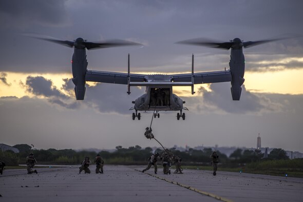 Commandos from four NATO nations fast-rope from a 352nd Special Operations Wing CV-22 Osprey at Air Base 6 Montijo, Portugal, during Trident Juncture, Oct. 27, 2015. The exercise tested  the response forces’ air, sea, land and Special Forces capabilities, to ensure that they are adapted to provide an integral part of NATO’s larger toolbox and to safeguard the alliance’s interests.  (U.S. Air Force photo by 1st Lt. Chris Sullivan/Released)