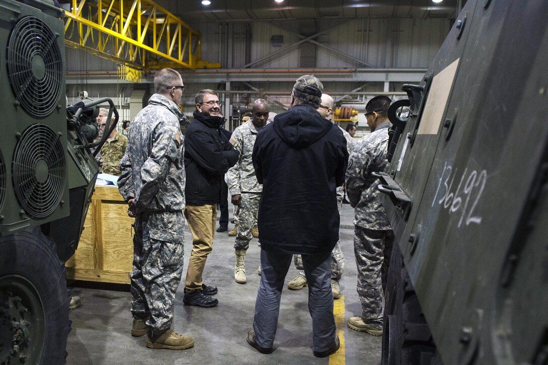 Defense Secretary Ash Carter speaks with soldiers of the 25th Infantry Division's 1st Stryker Brigade Combat Team, during a visit to Fort Wainwright, Alaska, Oct. 30, 2015. Carter is visiting the Asia-Pacific region, where he will meet with leaders from more than a dozen nations to help advance the next phase of the U.S. military’s rebalance in the region by modernizing longtime alliances and building new partnerships. Photo by Air Force Senior Master Sgt. Adrian Cadiz