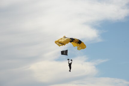 A member of the U.S. Army Golden Knights performs at the 2015 Joint Base San Antonio Air Show and Open House October 31, at JBSA-Randolph. The United States Army Parachute Team, nicknamed and commonly known as the Golden Knights, is a demonstration and competition parachute team of the United States Army.The demonstration teams, which use five dedicated aircraft, perform at more than 100 events per year. (U.S. Air Force photo by Joel Martinez/Released)