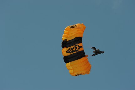A member of the U.S. Army Golden Knights performs at the 2015 Joint Base San Antonio Air Show and Open House Oct.31, 2015 at JBSA-Randolph. The United States Army Parachute Team, nicknamed and commonly known as the Golden Knights, is a demonstration and competition parachute team of the United States Army.The demonstration teams, which use five dedicated aircraft, perform at more than 100 events per year. (U.S. Air Force photo by Joel Martinez/Released)