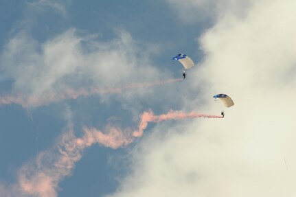 Members of the U.S. Air Force Wings of Blue parachute team perform during the 2015 Air Show and Open House at Joint Base San Antonio-Randolph Oct. 31, 2015. The Wings of Blue has both a demonstration team and a competition team. The demonstration team travels across the country to airshows, sporting events, and other venues to represent the Air Force in precision parachuting.  (U.S. Air Force photo by Melissa Peterson/released)
