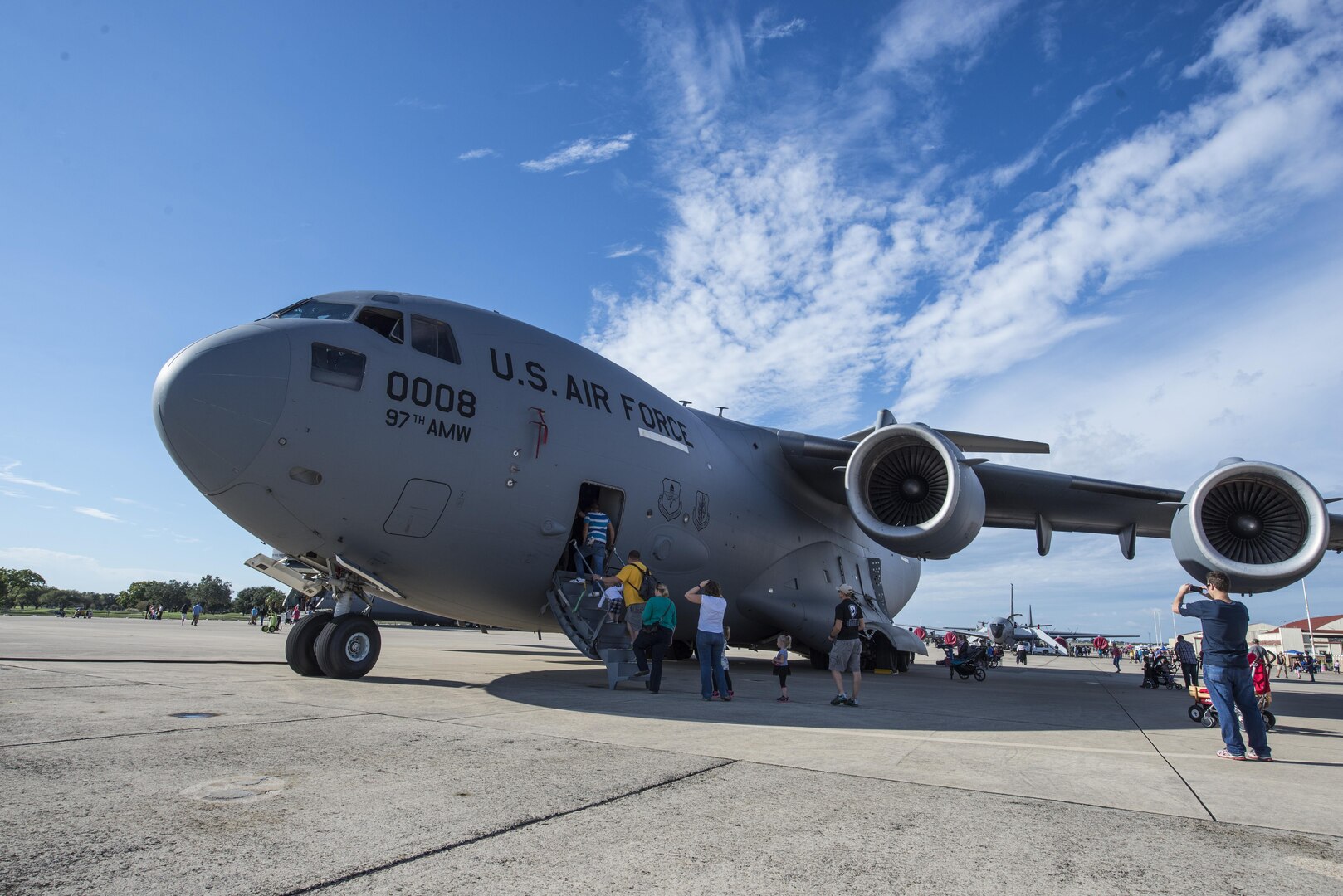 Visitors at  the Joint Base San Antonio Air Show and Open House set aboard a C-17 Globemaster III Oct. 31, 2015, at JBSA-Randolph, Texas. Air shows allow the Air Force to display the capabilities of our aircraft to the American taxpayer through aerial demonstrations and static displays. JBSA-Randolph’s air show allowed attendees to get up close and personal to see some of the equipment and aircraft used by the U.S. military today.